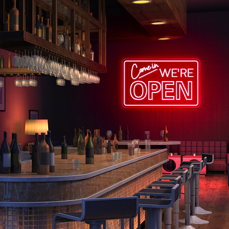 come in,WE'RE OPEN neon sign