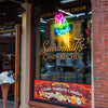 Rainbow ice cream cone with heart neon sign